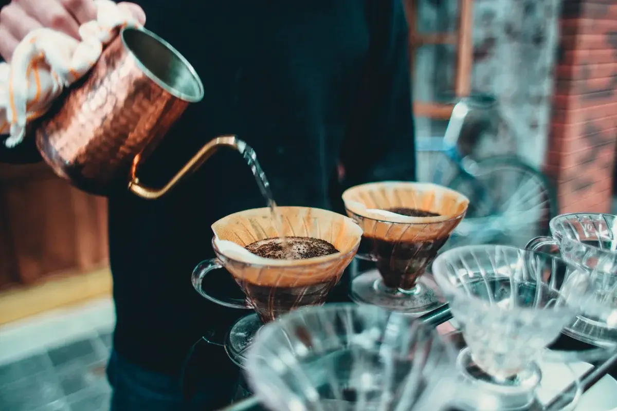 Pour-over coffee brewing with copper gooseneck kettle