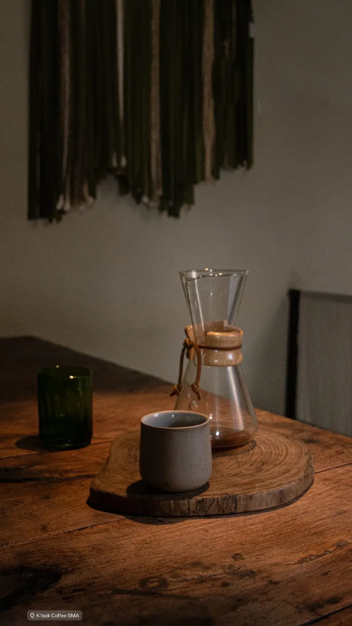 Chemex pour-over coffee on wooden table at Ki'bok SMA