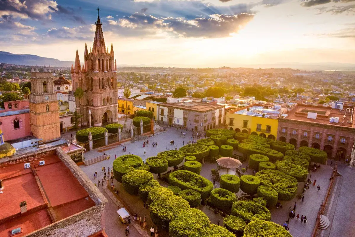 Aerial view of Jardín Principal and La Parroquia at sunset in San Miguel de Allende